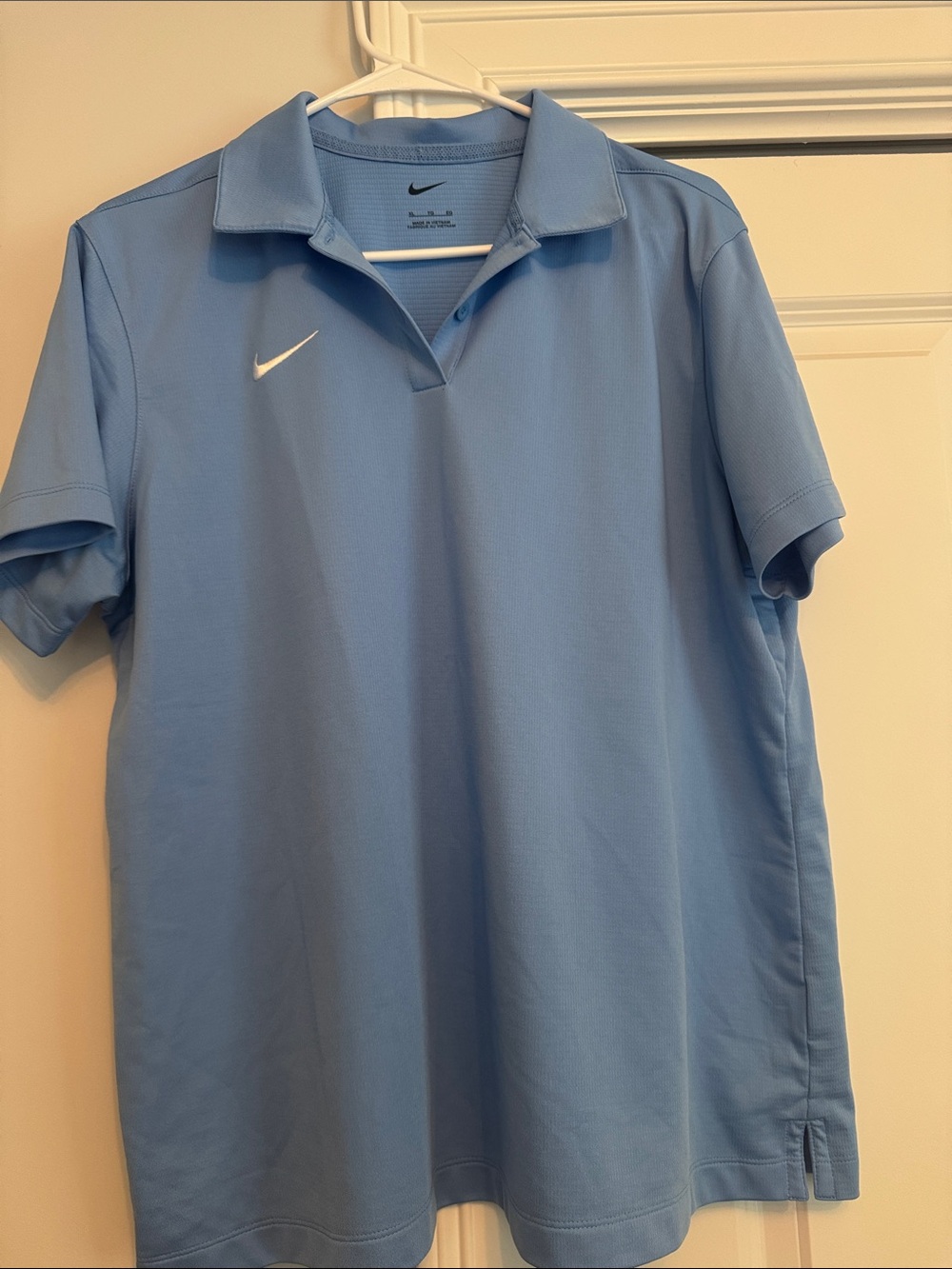 Nike Women’s Sky Blue Golf  Polo Shirt with White Swoosh- XL.